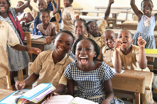 Children laughing in a classroom